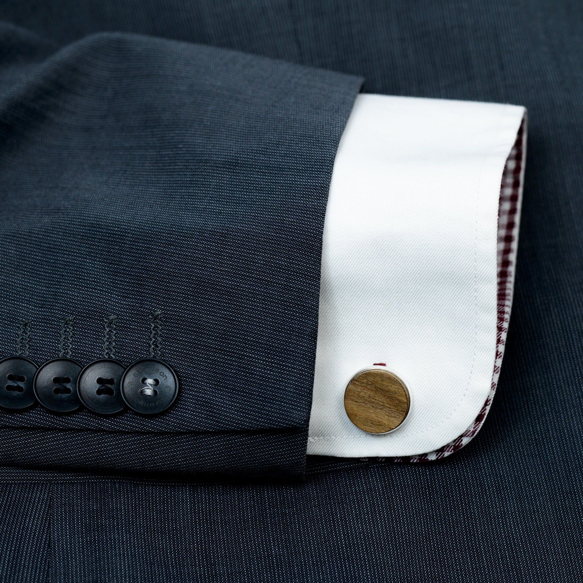 Custom wooden bowtie set with a selection of fabric pocket squares for a personalized touch.