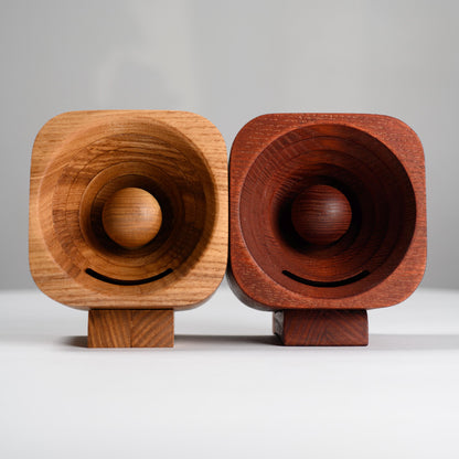 Stylish desk accessory and docking station for any smartphone.