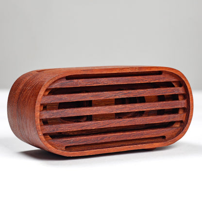 Compact wooden phone speaker with amplifier effect, perfect desk organizer and gift.