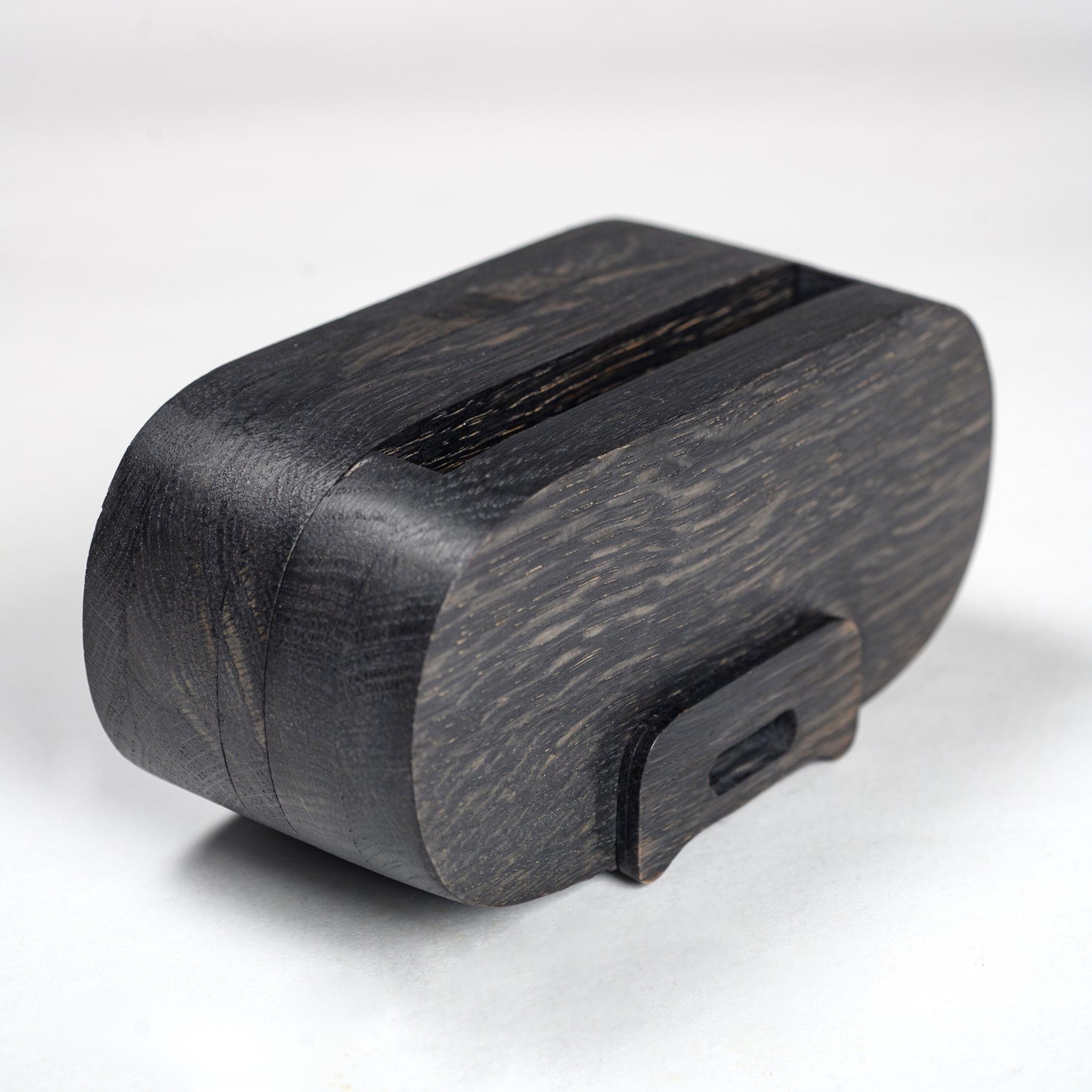 Compact wooden phone speaker with amplifier effect, perfect desk organizer and gift.