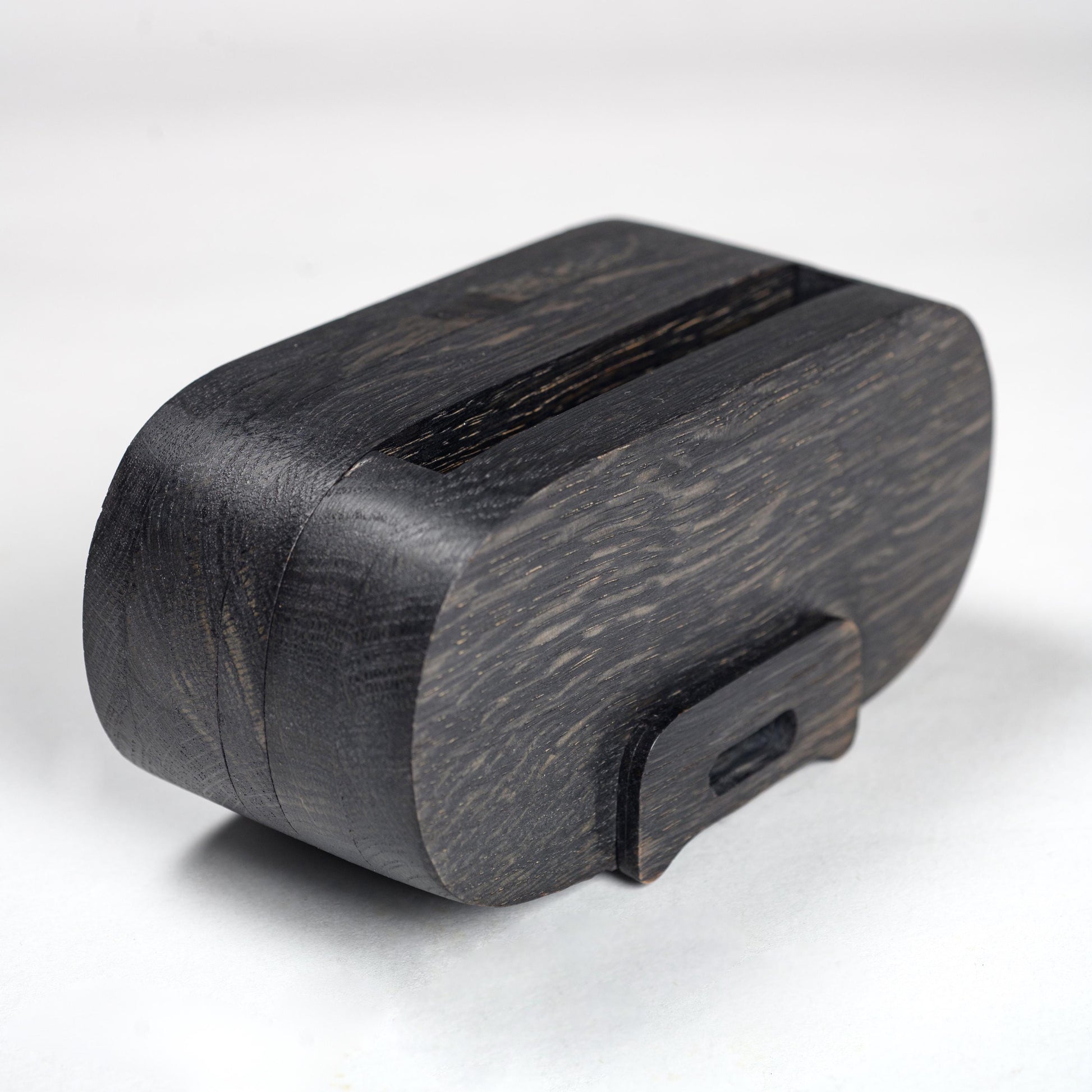 Compact wooden phone speaker with amplifier effect, perfect desk organizer and gift.