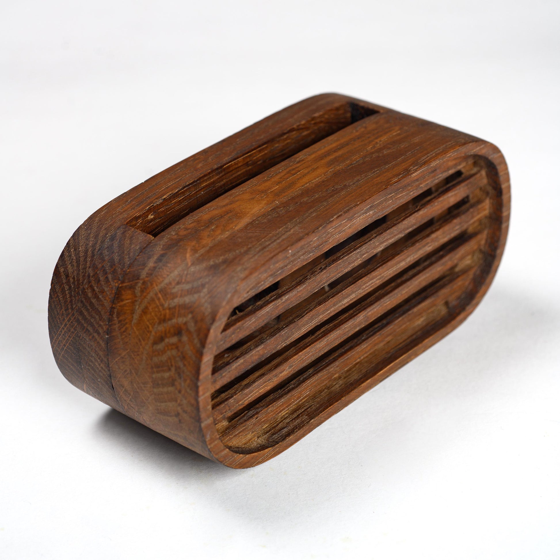 Compact wooden phone speaker with amplifier effect, perfect desk organizer and gift.