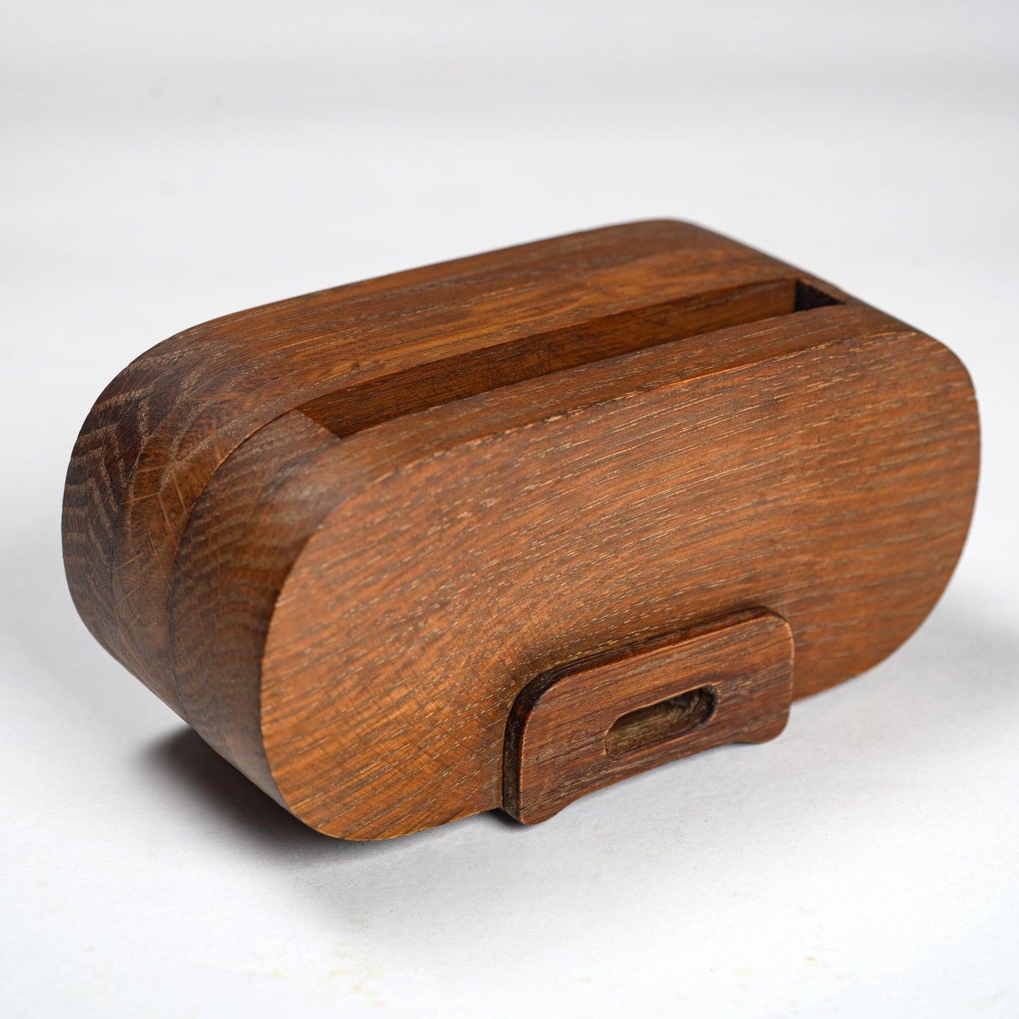 Compact wooden phone speaker with amplifier effect, perfect desk organizer and gift.
