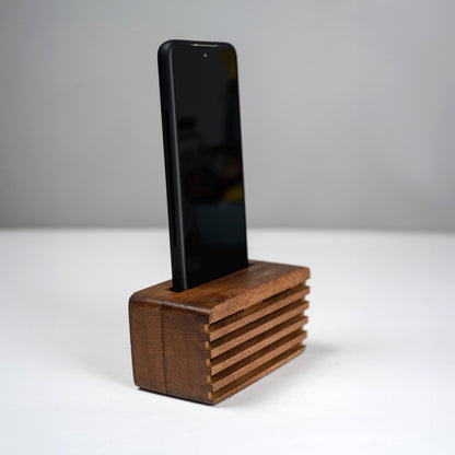 Ash wood phone stand with passive amplifier, doubles as a charging station and desk organizer.