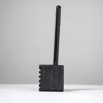 Ash wood phone stand with passive amplifier, doubles as a charging station and desk organizer.