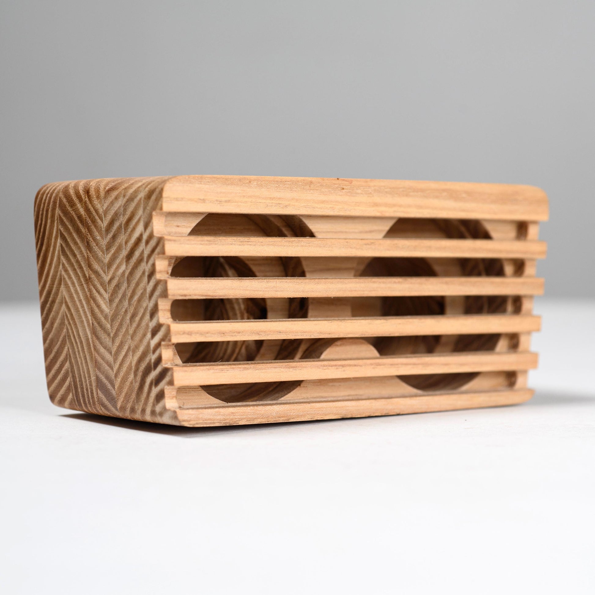 Rustic wooden phone speaker and stand, perfect office desk accessory and corporate gift.