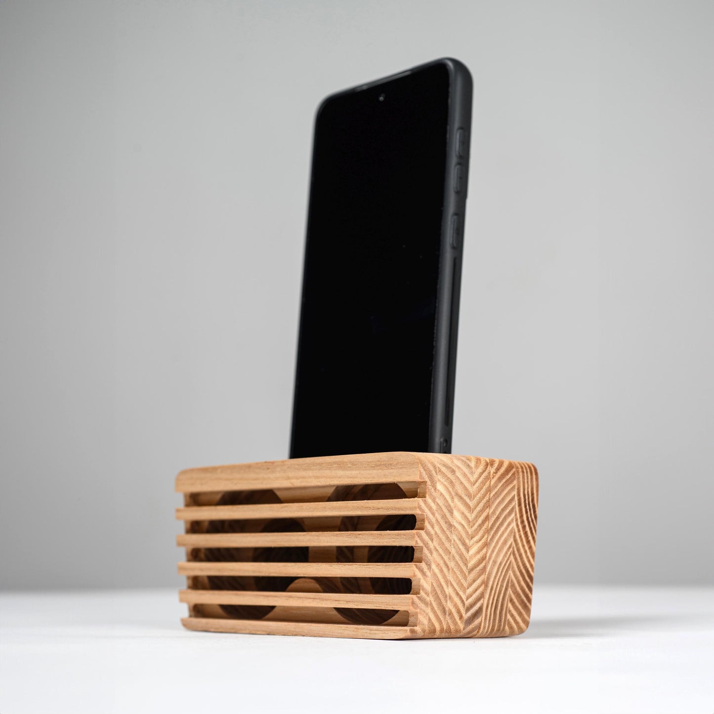 Handmade wooden phone speaker made from ash wood, passive sound amplifier for iPhone and Android.