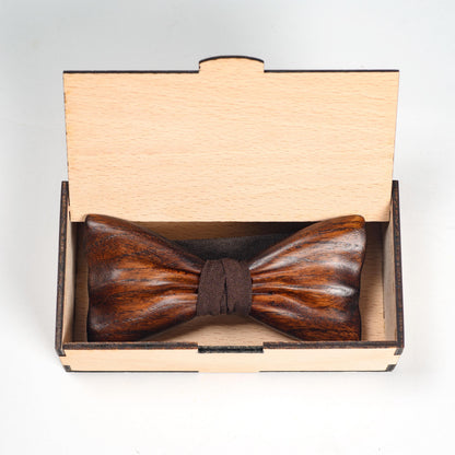 Wood bow tie inside wooden gift box