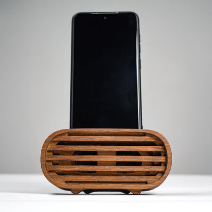 Oak wood phone stand with passive amplifier, boosts sound naturally, fits iPhone and Android.
