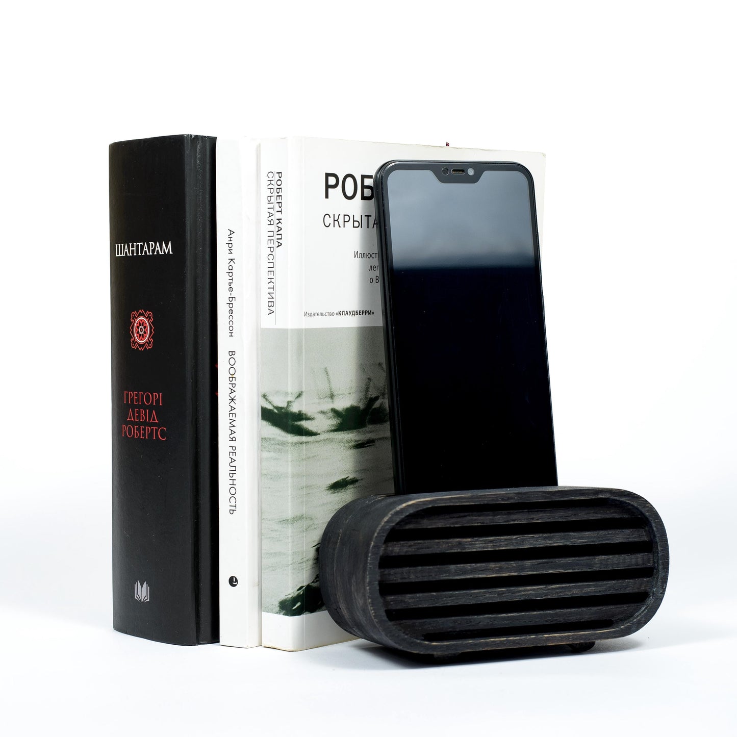 Compact wooden phone speaker with amplifier effect, perfect desk organizer and gift.