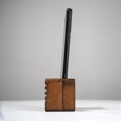 Ash wood phone stand with passive amplifier, doubles as a charging station and desk organizer.