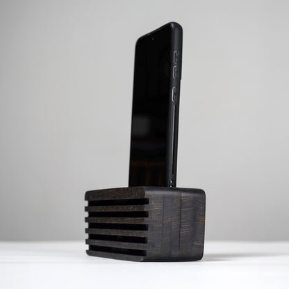 Ash wood phone stand with passive amplifier, doubles as a charging station and desk organizer.