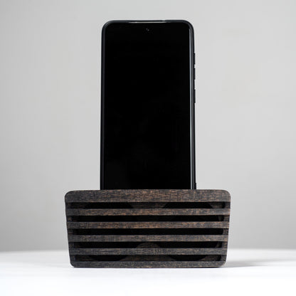 Ash wood phone stand with passive amplifier, doubles as a charging station and desk organizer.