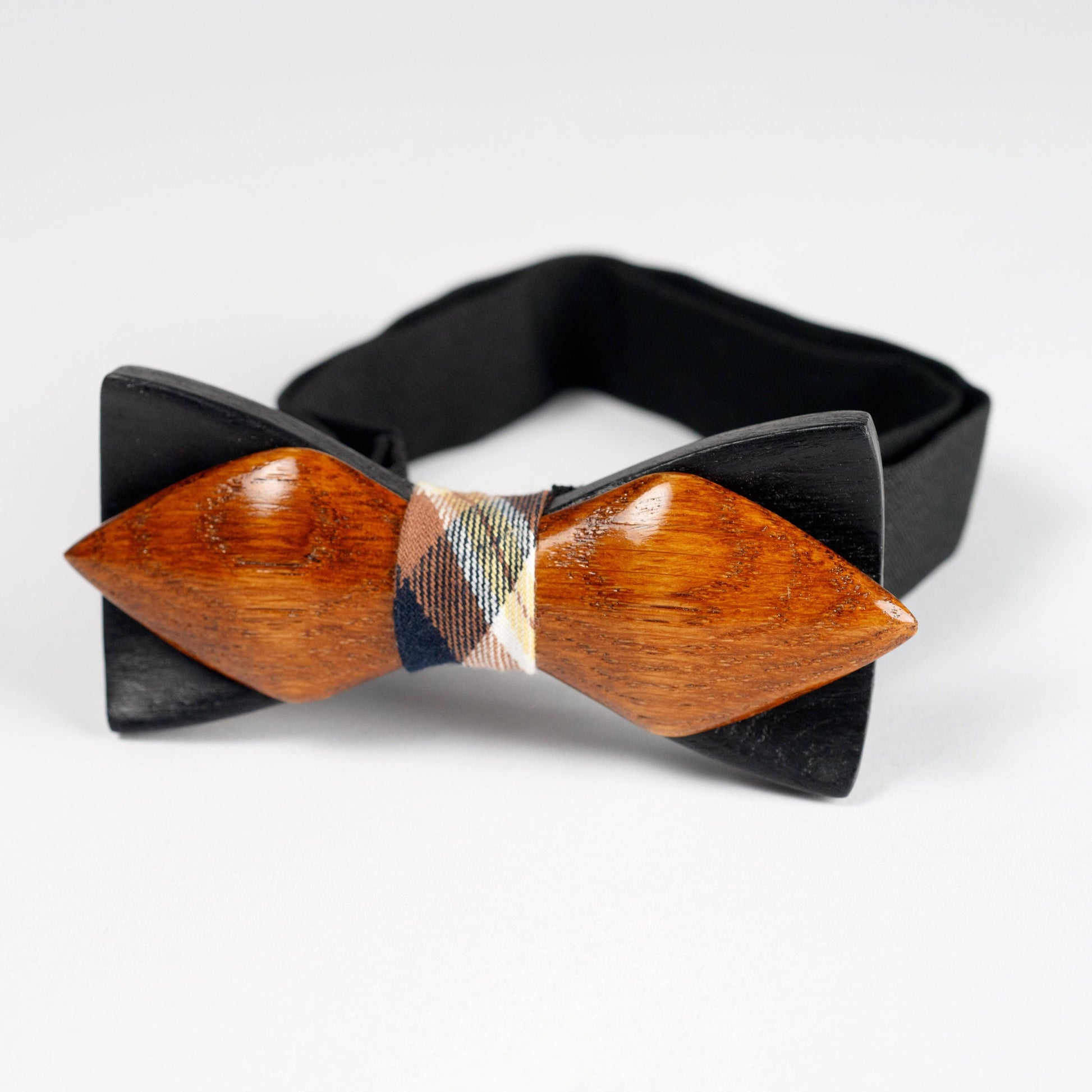 Personalized wooden bow tie placed beside its custom engraved wooden gift box.