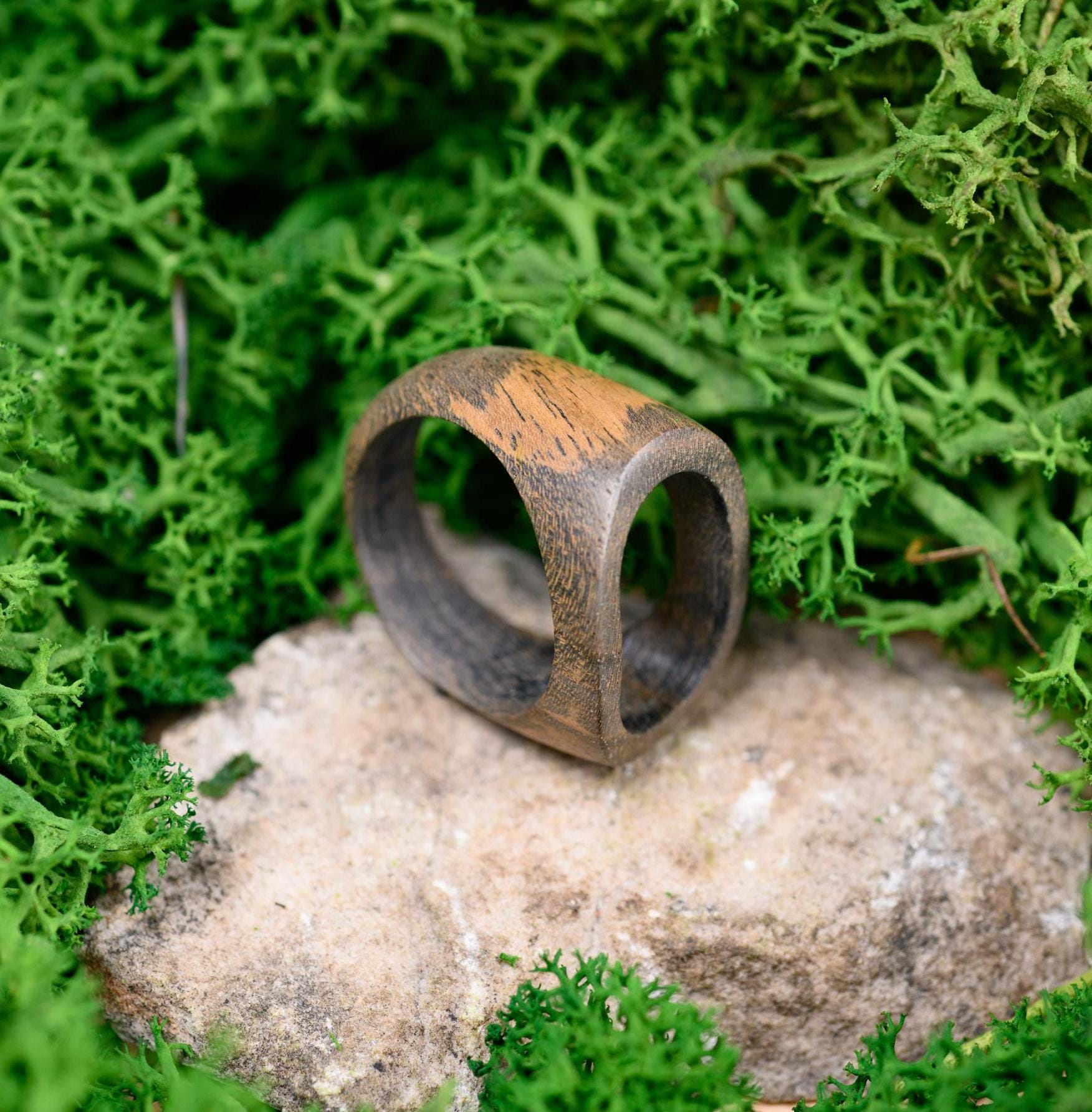 Engraved walnut wood ring with a unique design, ideal as a 5th anniversary gift for him.