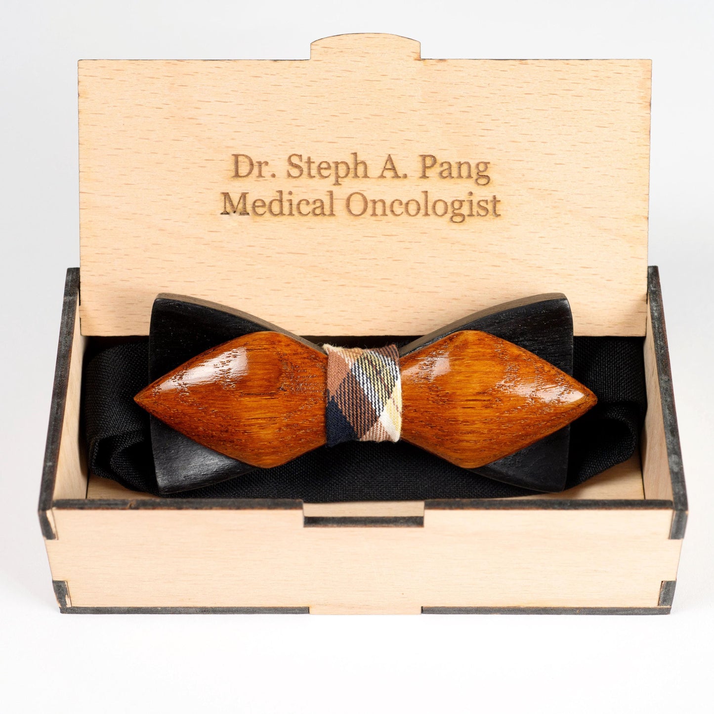 Groom styling a black and brown wooden bow tie, a perfect wedding and anniversary gift.
