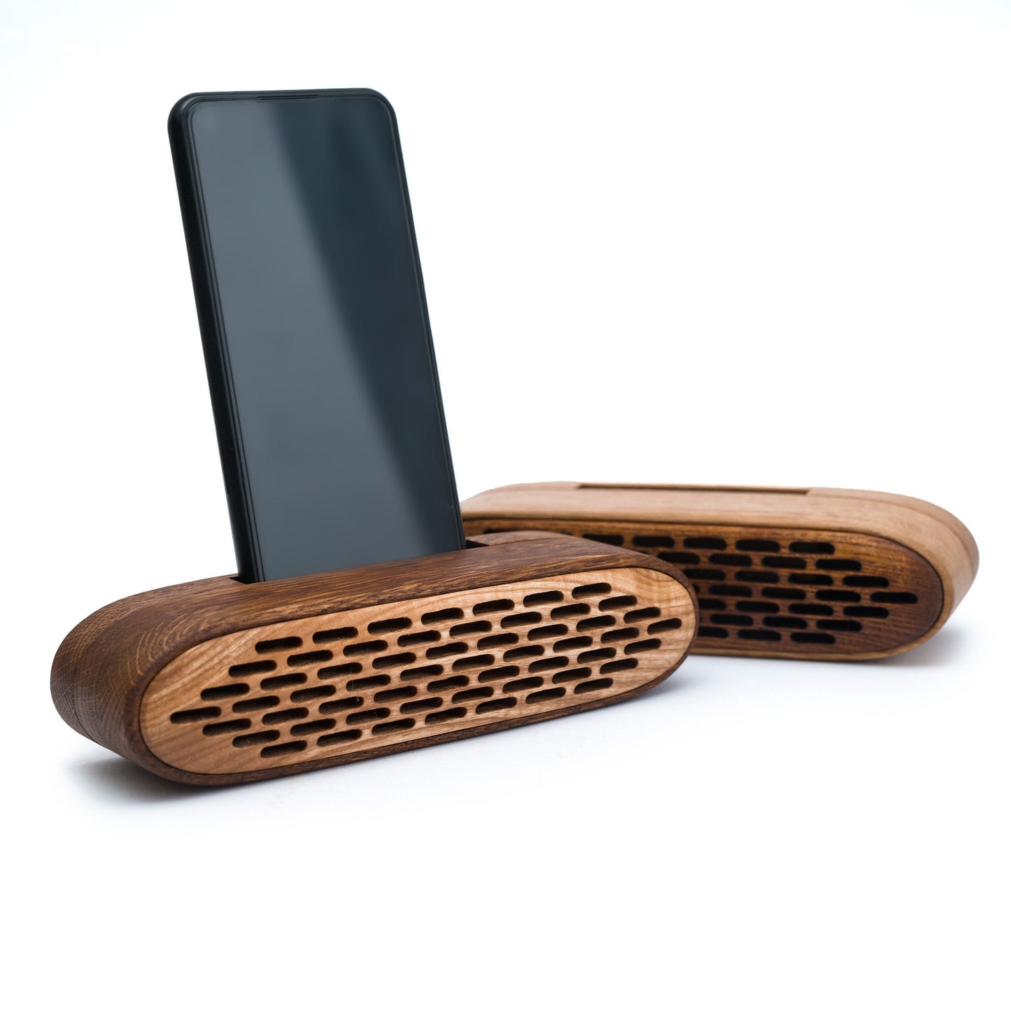 Handmade wooden phone speaker with an elliptical design – stylish docking station